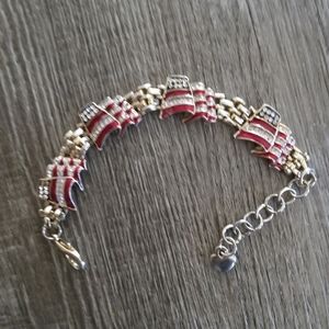 American flag bracelet. 8". Marked 2002 AD $6.00